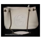  “Gucci” (?) White Leather Purse – used  Auction Estimate $100-$300 – Located Glassware 