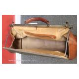  “Borchia” Leather Made in Italy Duffle Bag with Metal Hardware  Auction Estimate $100-$300 – Locate