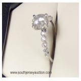  14 Karat White Gold Diamond Band with 1.05 Carat Center Stone  Auction Estimate $1000-$2000 – Locat