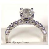  14 Karat White Gold Diamond Band with 1.05 Carat Center Stone  Auction Estimate $1000-$2000 – Locat