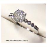  14 Karat White Gold Diamond Band with 1.05 Carat Center Stone  Auction Estimate $1000-$2000 – Locat