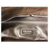  Brown Leather “Prada” Purse Made in Italy  Auction Estimate $100-$300 – Located Glassware 