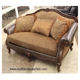  2 Piece Leather and Upholstered Sofa and Loveseat  Auction Estimate $200-$400 – Located Inside 