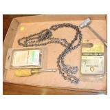 Lot 108F Chainsaw accessories including chains and wrench