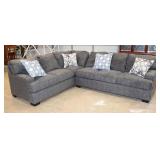  Lot 157 New 2pc L shaped sectional sofa with decorative pillows in the grey velour style upholstery