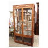  Lot 208 Asian hardwood 2pc 4 door display cabinet with mother of pearl inlay and glass shelves