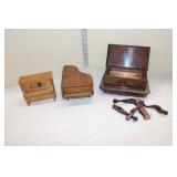  Lot 256 3 piano shape music boxes, one legs need put on, approx. largest is 7"w smallest is 5"w