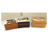  Lot 257 3 lift top music boxes, 2 in Hummel style and other is a Thorens, approx. largest 5" and sm