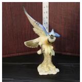  Lot 301 Lorenz Hutschnenreuther, Kunstabteilung, Germany porcelain figurine of blue jay bird on bra