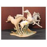  Lot 324 Vintage Lladro large porcelain figurine of 3 wild horses, has nip in ear