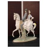  Lot 328 Vintage Lladro porcelain figurine of man and woman on horse