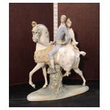  Lot 329 Vintage Lladro porcelain figurine of man and woman on horse