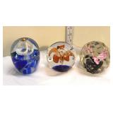 Lot 430 (3) Vintage hand blown art glass paperweights, one candle with wick