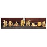  Lot 509 (8) Asian vintage hand carved miniature figures, some signed