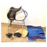  Lot 599 Ortho Flex 12" black leather riding saddle with accessories and stand and blanket