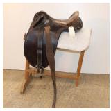  Lot 603 Australian Outrider 13" riding leather saddle, two tone brown, with blanket and stand