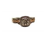  Lot 684A Beautiful 14K white and rose gold diamond ring in the halo style approx. size 9