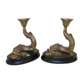  Lot 720 Pair of bronze fish on wooden base candle stands