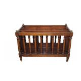  Lot 773 Solid mahogany Canterbury/magazine rack with brass accents