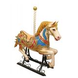 Lot 137: Fancy carousel style decorator horse on an iron scroll base, good shape, good paint, in the composition, (great to use as photo props) 64"l x 16"w x 64"h 
