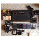 ATARI game console with controllers and games