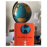vintage globe with original book