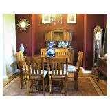 Square Dining Table with built in leafs all the way around that turns it into a round table with 6 C