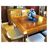 Square Dining Table with built in leafs all the way around that turns it into a round table with 6 C