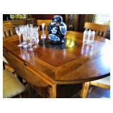 Square Dining Table with built-in Drop leaf which turns it into a round table with 6 Chairs 