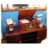 Musician 8-in-1 Record Player includes a cassette player, AM/FM radio, and a CD player with Bluetoot