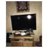 60" flat screen tv & surround sound deck