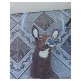 Deer bust statue