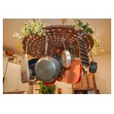 Cast aluminum table top turned into a pot rack