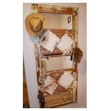 Antique door turned into a wall-mount hall tree