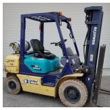 2000 Komatsu forklift,  triple mast, propane or gas, 2594 hours, hard rubber tires 