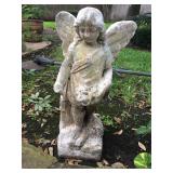 Outdoor concrete angel statue. Measures approximately 24” tall x 13” wide. 