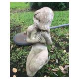 Outdoor concrete nude statue. Measures approximately 17” tall x 7” wide.