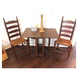 Antique Ladder Back Cane Chairs Set of 2 Price is for the set. Sturdy condition.