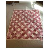 Hand made, hand stitched quilt Measures 63” x 6’. No holes.