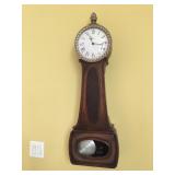 Large Howard Miller  pendulum wall clock, works & chimes beautifully