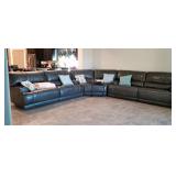 Reclining Electric Sofa. Double Recliners in 4 places to seat eight people plus extra in the center.