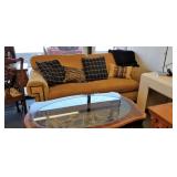 Sofa and throws and coffee table