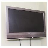 wall mounted Toshiba 32" t.v. 