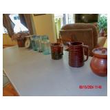blue jars, scales, pitchers