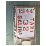 Numerous antique license plates