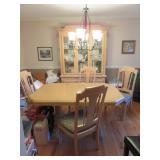 Blonde dining set; seating capacity for 8