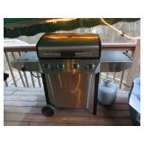 4 burner gas grill with warmer; like new condition