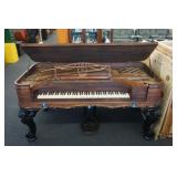 A Square Grand Piano.