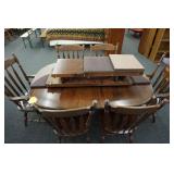 Dinning table with two leaves and 6 chairs