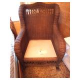 Wicker by Ethan Allen. This is a $350.00 chair easy folks. Talk to me.